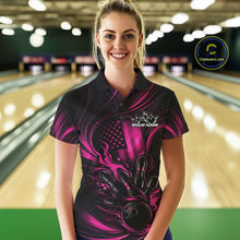 Load image into Gallery viewer, Female model wearing a black and pink bowling polo shirt at a bowling lane with patriotic bowling strike graphics and fiery details.