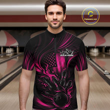 Load image into Gallery viewer, Male model at a bowling lane wearing a black and pink bowling quarter-zip shirt with patriotic bowling strike artwork and fiery flag-inspired details.