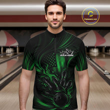 Load image into Gallery viewer, Male model wearing a black and green bowling quarter-zip shirt at a bowling lane with patriotic bowling strike graphics and distressed flag accents.