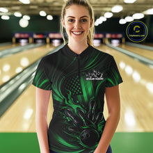 Load image into Gallery viewer, Female model at a bowling lane wearing a black and green bowling quarter-zip shirt with patriotic bowling strike artwork and distressed flag graphics.
