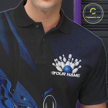 Load image into Gallery viewer, Close-up left chest detail of a black and blue bowling polo shirt featuring a flaming bowling ball striking pins with geometric accents.