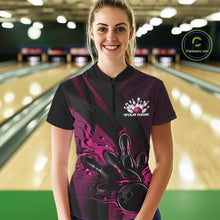 Load image into Gallery viewer, Female model at a bowling lane wearing a black and pink quarter zip shirt, front view showcasing flames bowling ball knocking down pins with bold geometric styling