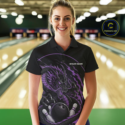 Front view of a female model in a bowling alley wearing a purple custom bowling polo shirt featuring an aggressive dragon with flames in a dynamic and energetic design.