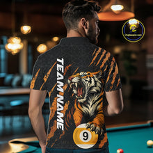 Load image into Gallery viewer, Back view of a male model wearing a polo shirt with roaring tiger motif, orange claw marks, and billiard balls.
