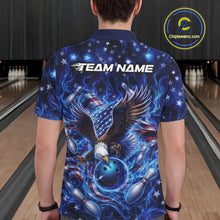 Load image into Gallery viewer, Back view of a male model in a bowling lane wearing a polo shirt with eagle artwork, bowling ball, flag elements, pins, and blue flames.
