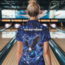 Load image into Gallery viewer, Back view female model at the bowling lane wearing a quarter zip shirt with eagle artwork, bowling ball, flag accents, pins, and blue flames.