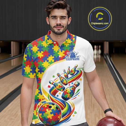 Male model in a bowling lane wearing a white polo shirt, front view highlighting autism bowling strike design with colorful puzzle elements