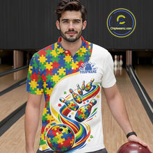 Load image into Gallery viewer, Male model in a bowling lane wearing a white polo shirt, front view highlighting autism bowling strike design with colorful puzzle elements