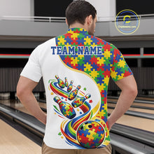 Load image into Gallery viewer, At Bowling Alley, Front View Male Model In White Quarter-Zip Shirt Displaying Autism-Themed Bowling Strike Illustration And Multicolor Puzzle Pattern Design