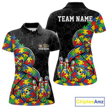 Load image into Gallery viewer, Women’s polo shirt mockup front and back featuring autism awareness ribbon filled with puzzle pattern, butterfly accents, and bowling ball striking pins on black shirt