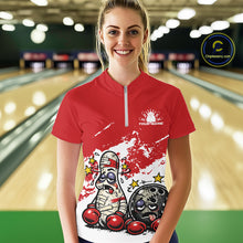 Load image into Gallery viewer, Female model in a bowling lane wearing a red and white quarter-zip shirt, playful boxing bowling ball and pin illustration with bold tones.