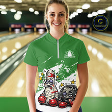 Load image into Gallery viewer, Female model at a bowling lane wearing a green and white quarter-zip shirt, funny boxing-style bowling ball and pin artwork with comedic energy.