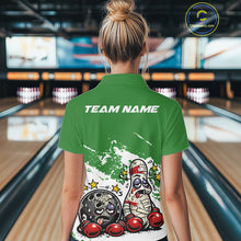 Load image into Gallery viewer, Back view of a female bowler in a green and white quarter-zip shirt, cartoon boxing bowling ball and pin design highlighted on the back.