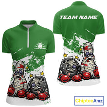 Load image into Gallery viewer, Front and back view of a women’s quarter-zip bowling shirt mockup in green and white, featuring playful cartoon boxing bowling ball and pin illustration.