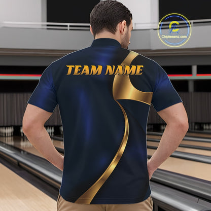 A man viewed from behind wearing a custom bowling shirt with a dark blue and gold graphic design and 'TEAM NAME' printed on the back, set against a bowling alley background.