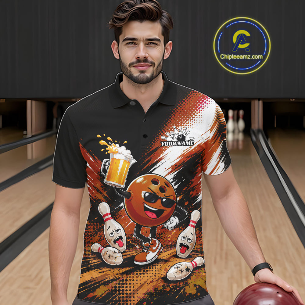 A man wearing a black short-sleeve polo shirt with a colorful bowling-themed graphic print, standing in a bowling alley holding a bowling ball. The shirt features a cartoon bowling ball character, bowling pins, and a beer mug on an orange and white abstract background.