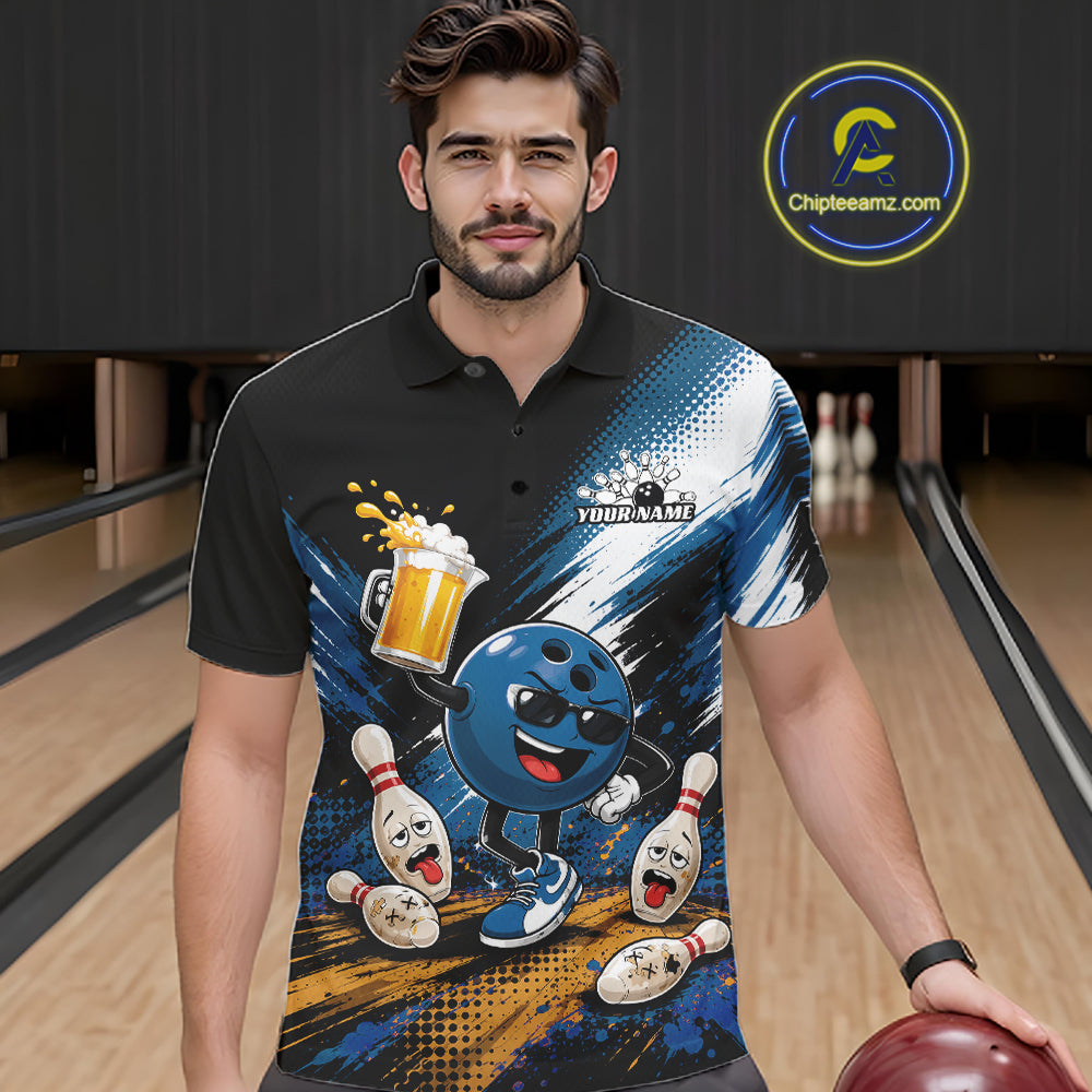 A man wearing a black short-sleeve polo shirt with a colorful bowling-themed graphic print, standing in a bowling alley holding a bowling ball. The shirt features a blue cartoon bowling ball character, bowling pins, a beer mug, and a 'YOURNAME' 