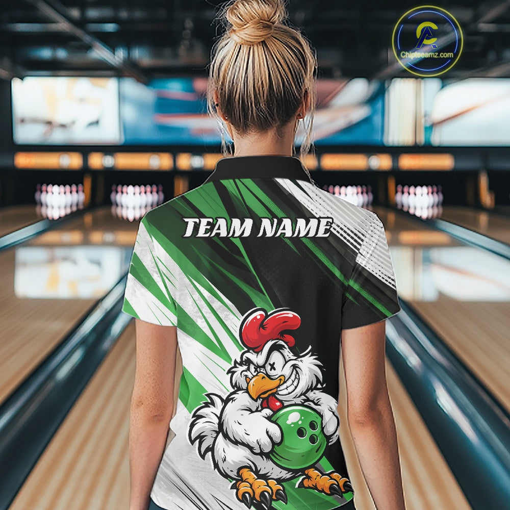 A woman viewed from behind wearing a custom bowling shirt with a cartoon chicken graphic and 'TEAM NAME' text, standing in a bowling alley.
