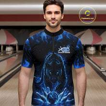Load image into Gallery viewer, Front view of a male model in a bowling lane wearing a black quarter-zip shirt with glowing blue electric panther and energetic bowling strike graphics.