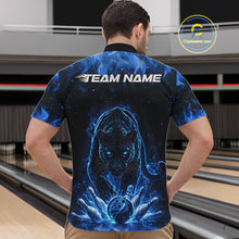 Load image into Gallery viewer, Front view of a male model in a bowling lane wearing a black quarter-zip shirt featuring glowing blue electric panther artwork with dynamic bowling action scene.