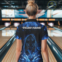 Load image into Gallery viewer, Back view of a female model in a bowling lane wearing a black quarter-zip shirt featuring glowing blue electric panther artwork with bold bowling action scene.
