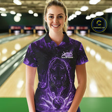 Load image into Gallery viewer, Front view of a female model in a bowling lane wearing a black polo shirt with glowing purple electric panther and bowling action illustration.