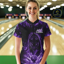 Load image into Gallery viewer, Front view of a female model in a bowling lane wearing a black quarter-zip shirt featuring a glowing electric panther in purple with bowling ball crashing through pins artwork.