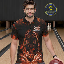 Load image into Gallery viewer, Front view of a male model in a bowling lane wearing a black polo shirt with glowing orange electric panther and bowling ball crashing through pins dynamic sports graphic.