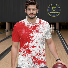 Load image into Gallery viewer, Front view of a male model in a bowling lane wearing a red and white splatter polo shirt with dynamic sporty bowling graphics.