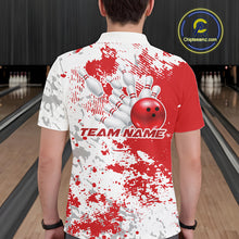Load image into Gallery viewer, Back view of a male model in a bowling lane wearing a red and white splatter polo shirt featuring clean bowling-inspired design accents.
