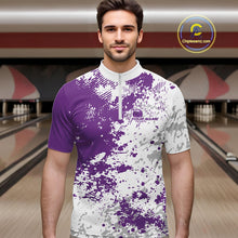 Load image into Gallery viewer, Male model at a bowling lane wearing purple and white quarter zip shirt, front view featuring abstract splatter design with modern athletic look