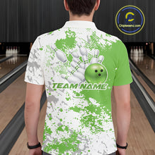 Load image into Gallery viewer, Back view of a male model in a bowling lane wearing a green and white splatter polo shirt featuring simple athletic bowling graphics.