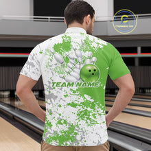 Load image into Gallery viewer, Male model at a bowling lane wearing green and white quarter zip shirt, front view featuring green splatter background with minimal abstract sports design