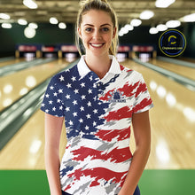 Load image into Gallery viewer, Woman wearing a patriotic-themed shirt with a bowling alley in the background