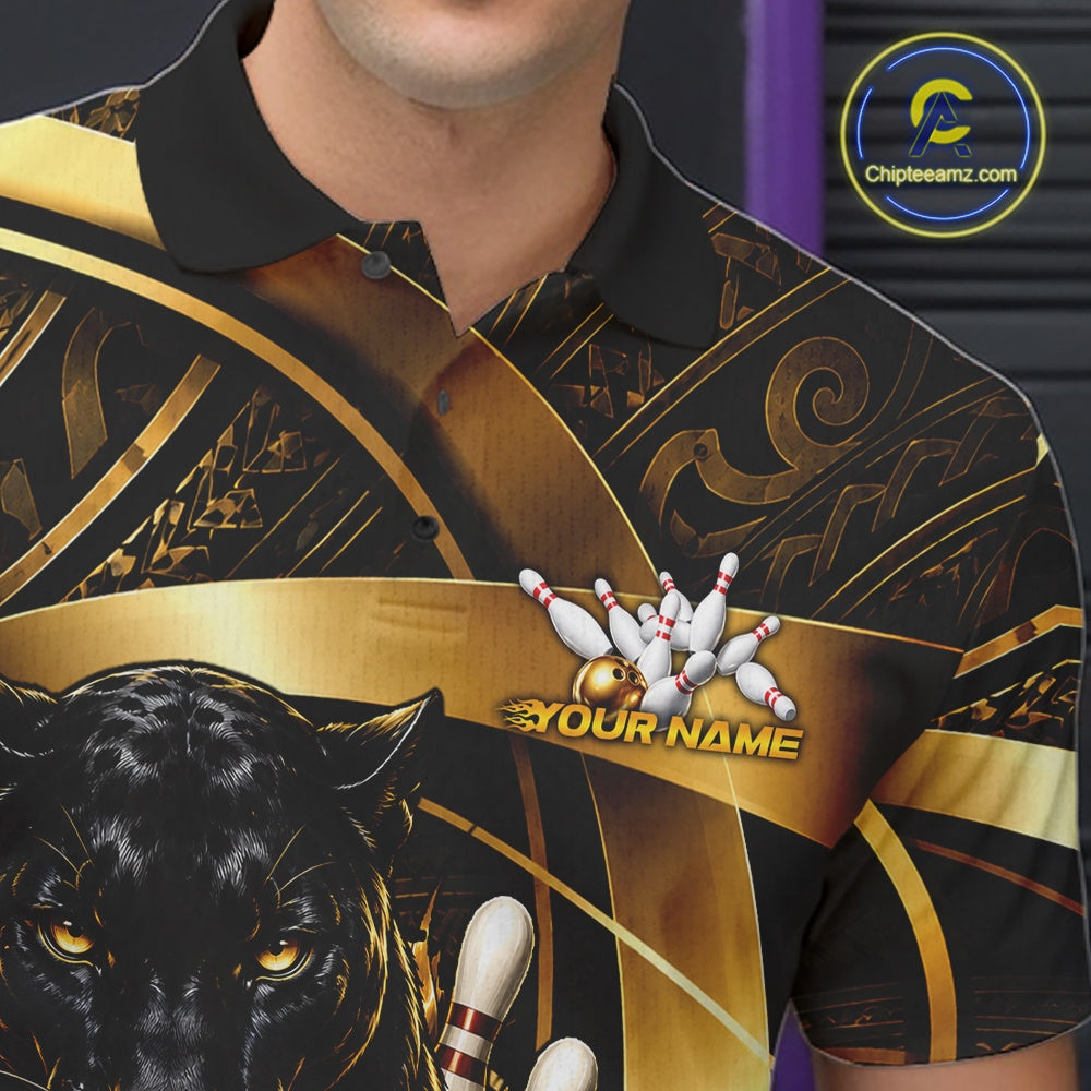 A close-up of a person wearing a short-sleeve polo shirt with a black and gold bowling-themed graphic print, featuring a panther face, bowling pins, bowling balls, and the text 'YOUR NAME'.