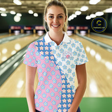 Load image into Gallery viewer, Female model at bowling lane front view wearing white polo shirt with white, blue and pink floral pattern, casual bowling center environment