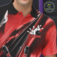 Load image into Gallery viewer, Close-up of the left chest on a black and red bowling polo shirt displaying bowling strike graphics with speed streak accents.