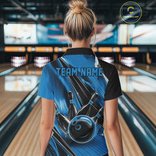 Load image into Gallery viewer, Back view of a female model in a black and blue bowling polo shirt featuring a bowling ball striking pins with dynamic speed streak graphics.