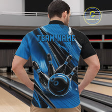 Load image into Gallery viewer, Front view of a male model in a black and blue bowling quarter-zip shirt showcasing fast-paced bowling artwork.