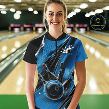 Load image into Gallery viewer, Female model wearing a black and blue bowling quarter-zip shirt at the bowling lane with energetic bowling strike artwork and motion streaks.