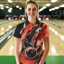 Load image into Gallery viewer, Female model wearing a black and orange bowling polo shirt at the lane with fast-moving bowling ball and pin artwork.