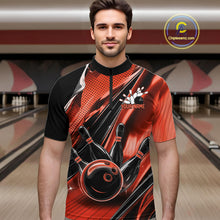 Load image into Gallery viewer, Male model wearing a black and orange bowling quarter-zip shirt at the lane with energetic bowling ball and pin graphics.