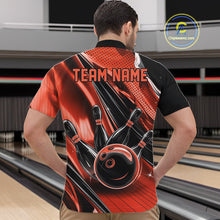 Load image into Gallery viewer, Front view of a male model in a black and orange bowling quarter-zip shirt featuring dynamic bowling motion artwork.