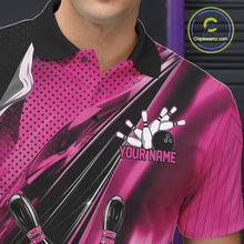 Load image into Gallery viewer, Left chest close-up of a black and pink bowling polo shirt featuring bowling strike artwork and motion streak details.