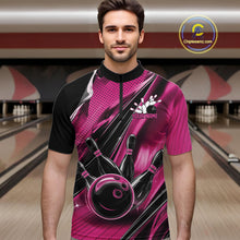 Load image into Gallery viewer, Male model wearing a black and pink bowling quarter-zip shirt at the bowling lane with fast-moving bowling strike graphics.