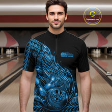 Load image into Gallery viewer, Male model wearing a black and blue bowling quarter-zip shirt at the bowling lane with Polynesian-inspired flame bowling artwork.