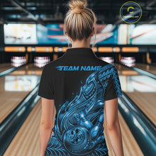 Load image into Gallery viewer, Back view of a female model in a black and blue bowling quarter-zip shirt displaying tribal flame bowling motifs.