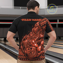 Load image into Gallery viewer, Front view of a male model in a black and orange bowling quarter-zip shirt showcasing flowing tribal bowling accents.