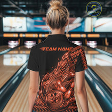Load image into Gallery viewer, Back view of a female model in a black and orange bowling quarter-zip shirt showcasing flowing tribal bowling artwork.