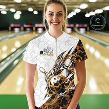 Load image into Gallery viewer, Female model wearing a white bowling quarter-zip shirt at the lane with orange camo bowling graphics and subtle bowling ball patterns.